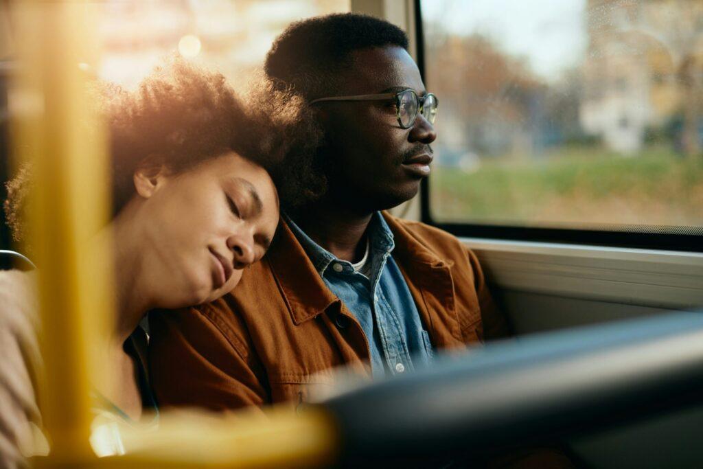 two people on a bus thinking about cultural communication issues in relationships