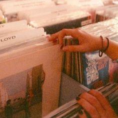 childhood trauma therapy represented by a person looking through vinyl